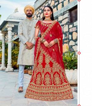 Get Ready The Day With This Heavy Designer Lehenga Choli In Red Color Paired With Colored Dupatta. This Designer Lehenga Choli Has Heavy Jari Embroidery With Stone Work. Its Blouse And Lehenga Are Fabricated On Art Silk Paired With Net Fabricated Dupatta. Buy This Soon Before The Stock Ends.