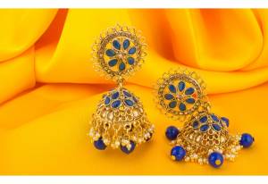 Enhance The Look of Your Simple Kurti Pairing It Up With This Beautiful Pair Of Earrings In Golden And Blue Color. Buy Now.