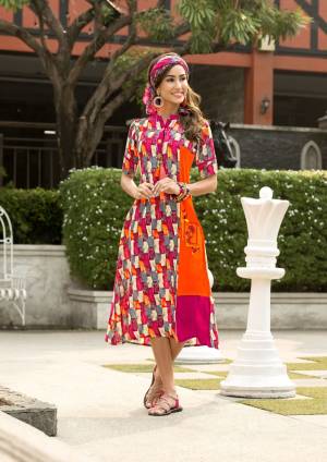 Shine Bright Wearing This Pretty Readymade Kurti In Pink And Orange Color Fabricated On Rayon Beautified with Multi Colored Prints All Over. This Kurti Is Available All Regular Size, Choose As Per Your Comfort.