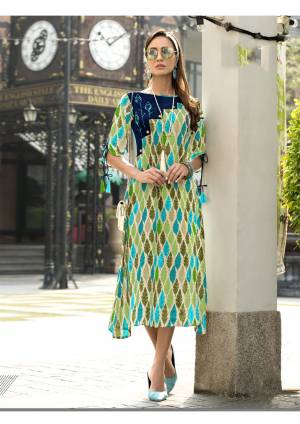 Rich And Elegant Looking Readymade Kurti Is Here In Light Blue And Green Color Fabricated On Rayon Beautified With Prints. This Pretty Kurti Is Soft Towards Skin And Ensures Superb Comfort All Day Long. Buy Now.