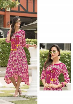 Look Pretty In This Printed Readymade Kurti In Pink Color Fabricated On Rayon. This Kurti Is Available In All Regular Sizes. Also It IS Light Weight And Easy To Carry All Day Long.