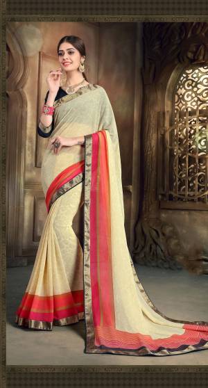 Simple And Elegant Looking Saree Is Here In Cream Color Paired With Black Colored Blouse. This Saree Is Fabricated On Georgette Paired With Art Silk Fabricated Blouse. It Has Very Light Prints And Lace Border. 