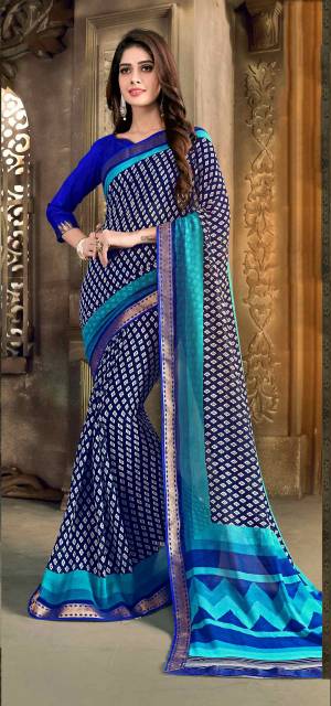 This Saree Is Perfect For Your Casual Wear, Grab This Saree In Navy Blue Color Paired With Royal Blue Colored Blouse. This Saree Is Fabricated On Georgette Paired With Art Silk Fabricated Blouse. 