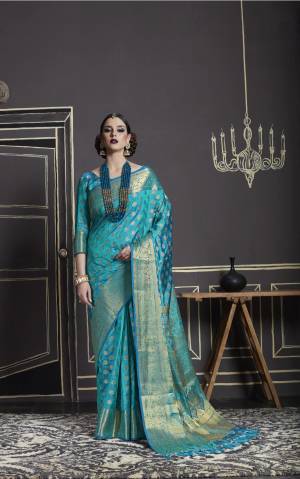 Grab This Pretty Attractive Saree In Blue Color Paired With Blue Colored Blouse. This Saree And Blouse Are Fabricated On Nylon Art Silk Beautified With Weave All Over It. It Is Easy To Drape And Carry All Day Long.