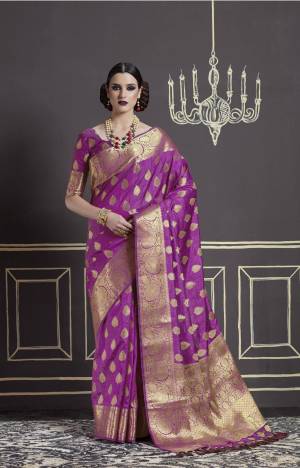 Here Is An Attractive Shade In Pink With This Sareee In Magenta Pink Color Paired With Magenta Pink Colored Blouse. This Saree And Blouse Are Fabricated On Nylon Art Silk Beautified With Weave All Over It.
