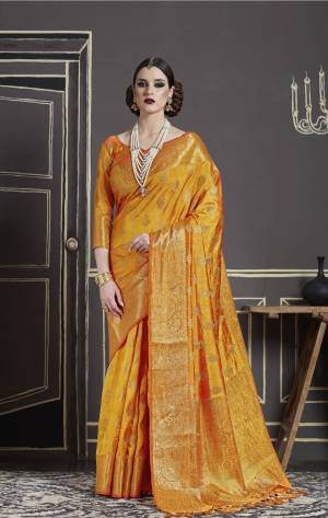 Celebrate This Festive Season Wearing This Saree In Musturd Yellow Color Paired With Musturd Yellow Colored Blouse. This Saree And Blouse Are Fabricated On Nylon Art Silk Beautified With Weave All Over It. It Has Great Shine And Luster In Fabric. Buy This Saree Now.