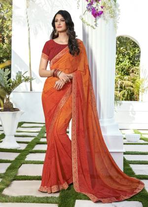 New And Unique Shade In Orange Is Here With This Rust Orange Colored Saree Paired With Red Colored Blouse. This Saree And Blouse are Fabricated On Georgette Beautified With Prints All Over. Buy This Saree Now.