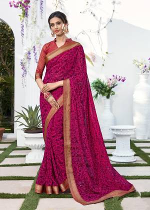 Attract All With This Bright Colored Saree In Magenta Pink Color Paired With Dark Pink Colored Blouse. This Saree Is Fabricated On Chiffon Paired With Brocade Fabricated Blouse. It Is Light Weight And easy To Carry All Day Long.