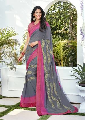 You Will Definitely Earn Lots Of Compliments From Wearing This Pretty Saree In Grey Color Paired With Dark Pink Colored Blouse. This Saree Is Fabricated On Georgette Paired With Brocade Fabricated Blouse. Buy This Saree Now.