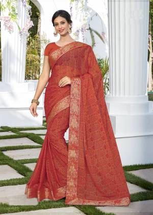 New And Unique Shade In Orange Is Here With This Rust Orange Colored Saree Paired With Rust Orange Colored Blouse. This Saree And Blouse are Fabricated On Georgette Beautified With Prints All Over. Buy This Saree Now.
