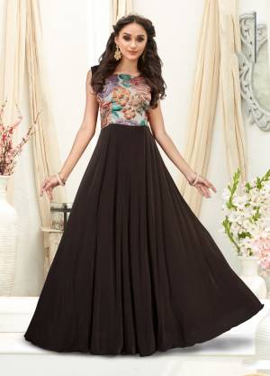 Get Ready For The Next Party With This Beautiful Designer Floor Length Gown In Brown Color Beautified With Fancy Fabric Work Over The Yoke. Its Fabric Enures Superb Comfort, Buy This Readymade Gown Now.