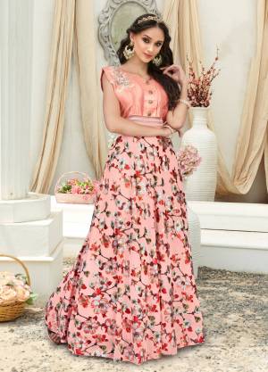 Look Pretty In This Peach Colored Gown Fabricated On Fancy Fabric Beautified With Beautified With Prints And Patch Work. This Gown Is Light Weight And Easy To Carry Throughout The Gala. Buy It Now.