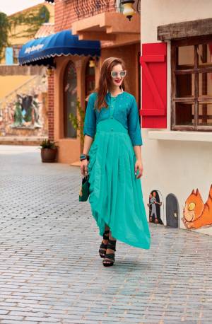 Look Pretty In This Designer Readymade Kurti In Turquoise Blue Color Fabricated On Soft Silk Beautified With Moti And Stone Work. Buy This Kurti Soon Before The Stock Ends.