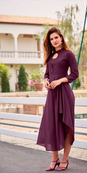 Another Kurti With Assymetric Pattern Is Here In Purple Color. This Readymade Kurti Is Fabricated On Soft Silk Beautified With Moti And Stone Work. 
