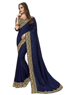 Enhance Your Personality Wearing This Saree In Navy Blue Color Paired With Navy Blue Colored Blouse. This Saree Is Fabricated On Satin Silk Paired With Art Silk Fabricated Blouse. Buy This Saree Now.
