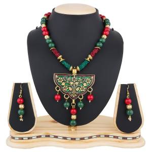 Go Colorful With This Multi Colored Necklace Set Beautified With Maroon And Green Colored Beads. This Lovely Set can Be Paired With Any Traditional Attire.