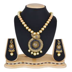 For That Lovely Blue  Colored Dress, Here Is Perfect Necklace Set To Pair Up With. This Golden Colored Necklace Set Is Mix Metal Based Beautified With Blue Colored Stones. Buy It Now.