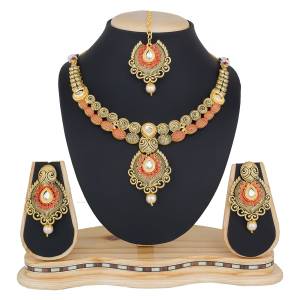 If You Like Traditionals And Traditonal Look On Yourself Than Grab This Beautiful Designer Necklace Set In Golden Color That Can be Paired With Any Colored Traditional Attire. This Is Light Weight And Easy To Carry All Day Long.
