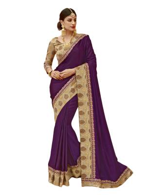 Attract All Wearing This Saree In Purple Color Paired With Beige Colored Blouse. This Saree Is Fabricated On Satin Silk Paired With Jacquard Silk Fabricated Blouse. This Simple Saree Looks Rich When You Drape It Pairing It With Accessories. 