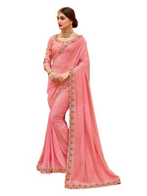 A Must Have Shade In Every Womens Wardrobe Is Here In Pink Color Paired With Pink Colored Blouse. This Saree Is Fabricated On Satin Silk Paired With Art Silk Fabricated Blouse. It Has Beautiful Embroidery Over The Blouse And Saree Lace Border. Buy Now.