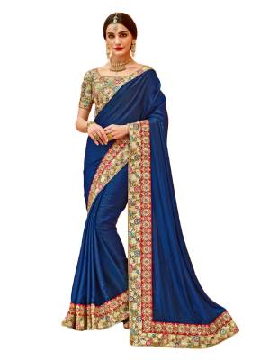 Bright And Visually Appealing Color Is Here With This Designer Saree In Dark Blue Color Paired With Beige Colored Blouse. This Saree Is Fabricated On Satin Silk Paired With Art Silk Fabricated Blouse. Its Fabrics Ensures Superb Comfort All Day Long. Buy Now.