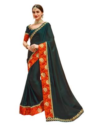 Dark And Attractive Shade In Green Is Here With This Designer Saree In Pine Green Color Paired With Pine Green Colored Blouse, This Saree Is Fabricated On Satin Silk Paired With Art Silk Fabricated Blouse. Buy This Designer Saree Now.