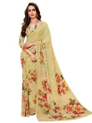 Simple and Elegant Looking Saree Is Here In Cream Color Paired With Cream Colored Blouse. This Saree And Blouse Are Fabricated On Georgette Beautified With Multi Colored Bold Floral Prints. Buy This Pretty Simple Saree Now.