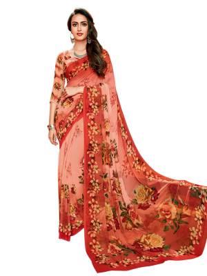 A Must Have Color In Every Womens Wardrobe Is Here In Dark Peach Color Paired With Dark Peach Colored Blouse, This Saree And Blouse Are Fabricated On Georgette Beautified With Bold Floral Prints All Over It. Buy It Now.