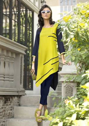 Assymteric Patterned Readymade Kurti Is Here In Yellow Color Fabricated On Rayon. This Kurti Is Available In All Regular Sizes. Buy This Readymade Kurti Now.