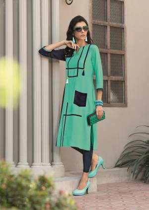 Add This Beautiful Readymade Kurti To Your Wardrobe For Your Casual Wear In Aqua Blue Color. This Kurti Is Fabricated On Rayon. Its Fabric Is Light Weight And Ensures Superb Comfort All Day Long.