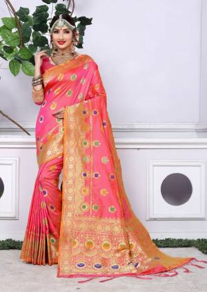 Shine Bright With This Lovely Traditonal Look Wearing This Silk Saree In Dark Pink Color Paired With Dark Pink Colored Blouse. This Saree And Blouse are Fabricated On Banarasi Art Silk Beautified With Weave All Over It. Buy This Saree Now.