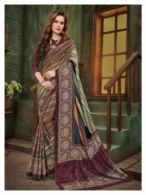 Go colorful Wearing This Saree In Multi Color Paired With Balck And Wine Colored Blouse. This Saree And Blouse Are Fabricated On Cotton Silk Beautified With Prints All Over It. Buy This Saree Now.
