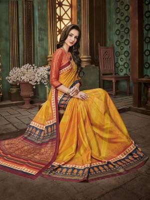 Celebrate This Festive Season with Beauty And Comfort Wearing This Saree In Musturd Yellow Color Paired With Orange Colored Blouse. This Saree And Blouse Are Fabricated On Cotton Silk Beautified With Prints All Over. 