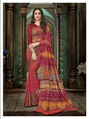 Go colorful Wearing This Saree In Multi Color Paired With Maroon Colored Blouse. This Saree And Blouse Are Fabricated On Cotton Silk Beautified With Prints All Over It. Buy This Saree Now.