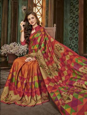 Attract All Wearing This Bright Colored Saree In Multi And Orange Color Paired With Dark Pink Colored Blouse, This Saree And Blouse Are Fabricated On Cotton Silk Beautified with Geometric And Floral Prints.