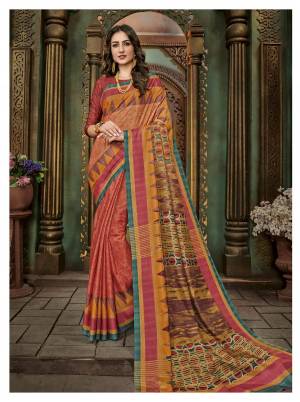 Go colorful Wearing This Saree In Multi Color Paired With Rust  Colored Blouse. This Saree And Blouse Are Fabricated On Cotton Silk Beautified With Prints All Over It. Buy This Saree Now.