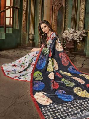 Enhance Your Personality Wearing This Saree In Navy Blue And White Color Paired With White And Red  Colored Blouse. This Saree And Blouse Are Fabricated On Cotton Silk Beautified With Multiple Prints All Over The Saree.