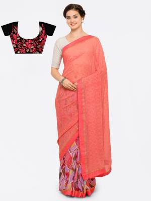 Look Pretty Wearing This Saree In Peach Color Paired With Contrasting Magenta Pink Colored Blouse. This Saree Is Fabricated On Georgette Beautified With Prints Paired With Art Silk Fabricated Blouse Beautified With Embroidery.