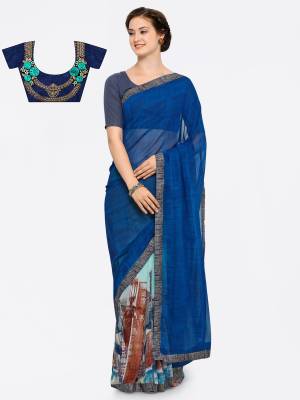 Go With This Shades Of Blue With This Saree In Blue And Aqua Blue Color Paired With Navy Blue Colored Blouse. This Saree Is Fabricated On Georgette Paired With Art Silk Fabricated Blouse. This Pretty Saree IS Beautified With Prints And Blouse With Embroidery. Buy It Now.