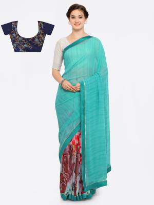 Add This Lovely Shade Of Blue to Your Wardrobe In Turquoise Blue Color Paired With Navy Blue Colored Blouse. This Saree Is Fabricated On Georgette Paired With Art Silk Fabricated Blouse. Both The Saree And Blouse Color Will Earn You Lots Of Compliments From Onlookers.
