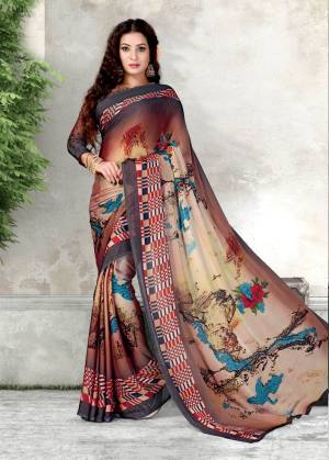 Grab This Beautiful And Elegant Looking Saree In Multi Color Paired With Brown Colored Blouse. This Saree And Blouse Are Fabricated On Chiffon Beautified with Prints All Over It. Also It Is Light Weight And Easy To Carry All day Long.