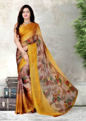 Be It Your Casul, Semi-Casual Or Social Gatherings, This Saree Is Suitable For All. Grab This Lovely Saree In Yellow Color Paired With Yellow Colored Blouse. This Saree And Blouse are Fabricated On Chiffon Beautified With Multi Colored Floral Prints.