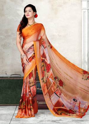 Orange Color Induces Perfect Summery Appeal To Any Outfit, So Grab This Attractive Saree In Orange Color Paired With Orange Colored Blouse. This Saree And Blouse Are Fabricated On Chiffon Beautified With Bold Floral And Abstract Prints. Buy This Now.