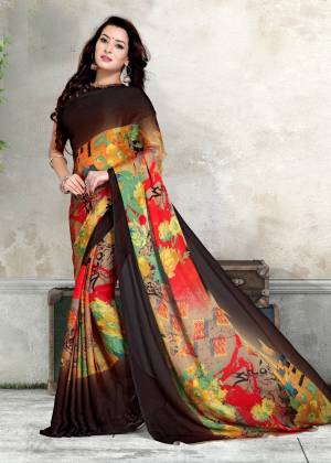 Add Some Casuals With This Simple Saree In Brown And Multi Color Paired With Brown Colored Blouse. This Saree And Blouse Are Fabricated On Chiffon Beautified With Abstract Prints. It Is Light Weight And Easy To Carry All Day Long.