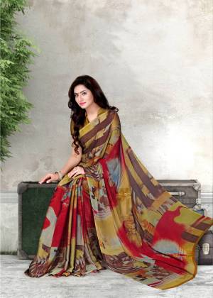 Colors Adds Beauty In Every Attire And Every Season, Grab This Multi Colored Saree Paired With Yellow Colored Blouse. This Saree And Blouse Are Fabricated On Chiffon Beautified With Prints. It Is Light Weight And Easy To Drape. Buy This Saree Now.