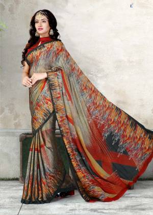 Flaunt Your Rich And Elegant Taste Wearing This Saree In Grey And Multi Color Paired With Contrasting Maroon Colored Blouse, This Saree And Blouse Are Fabricated On Chiffon Beautified With Prints. This Saree Gives A Unique Look To Your Personality.