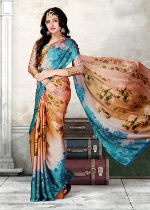 Beautiful Combination Is Here With This Printed Saree In Blue and Peach Color Paired With Blue And Peach Colored Blouse. This Saree And Blouse Are Fabricated On Chiffon Beautified With Floral Prints. It Is Light Weight And Easy To Carry All Day Long.