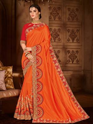 All the Fashionable women will surely like to step out in style wearing this orange color two tone silk fabrics saree. this gorgeous saree featuring a beautiful mix of designs. look gorgeous at an upcoming any occasion wearing the saree. Its attractive color and designer embroidered design, patch design, stone, designer blouse, beautiful floral design work over the attire & contrast hemline adds to the look. Comes along with a contrast unstitched blouse.