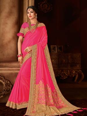 Flaunt a new ethnic look wearing this Fuschia pink color two tone silk fabrics with jacquard short pallu saree. this party wear saree won't fail to impress everyone around you. this gorgeous saree featuring a beautiful mix of designs. Its attractive color and designer embroidered design, patch design, stone, designer blouse, beautiful floral design work over the attire & contrast hemline adds to the look. Comes along with a contrast unstitched blouse.