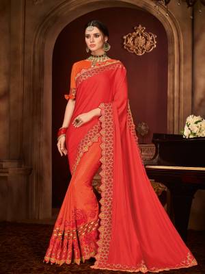 Classy, sensuous and versatile are the perfect words to describe this red and orange color two tone silk and Satin silk fabrics saree. Ideal for party, festive & social gatherings. this gorgeous saree featuring a beautiful mix of designs. Its attractive color and designer embroidered design, patch design, stone, moti, heavy designer blouse, beautiful floral design work over the attire & contrast hemline adds to the look. Comes along with a contrast unstitched blouse.